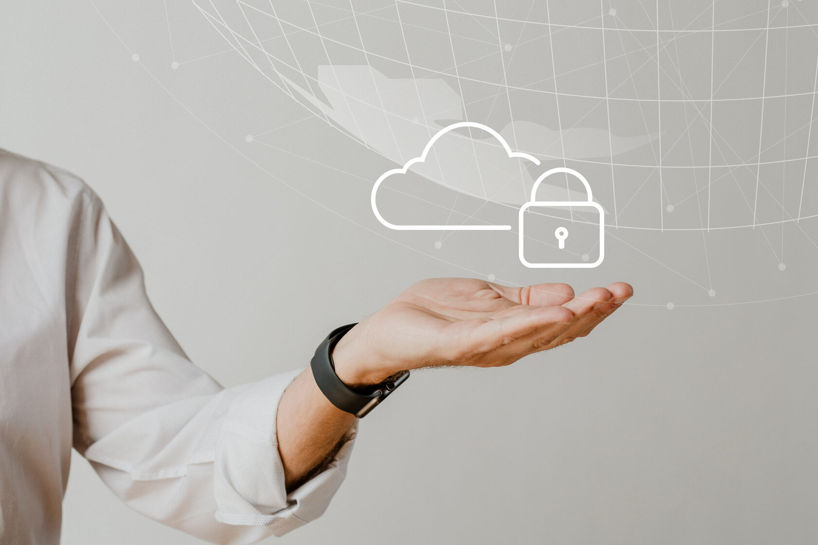 Hand holding a cloud symbol representing data security